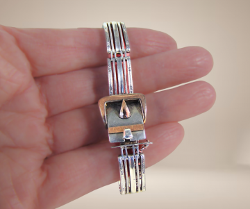 Art deco schakel sweetheart bracelet 800 zilver rose goud beige achtergrond