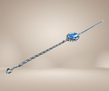 Art deco zilveren armband met blauwe paste facet steen beige achtergrond 2