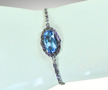 Art deco zilveren armband met blauwe paste facet steen pr