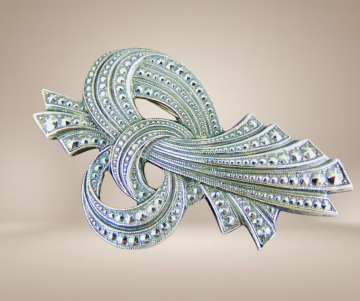 Art nouveau stijl  broches zilver strik knoop puntjes beige achtergrond 1