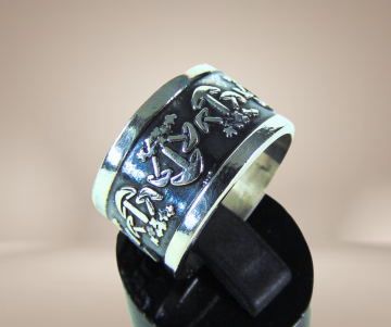 Brede taxco zilveren overlay paddo ring beige achtergrond