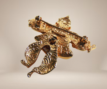 Clown broche 1928 vintage beige achtergrond