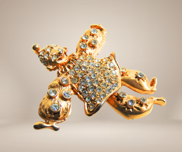 Clown broche 1928 vintage beige achtergrond 2