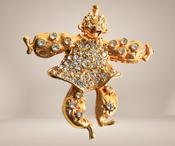 Clown broche 1928 vintage beige achtergrond 5