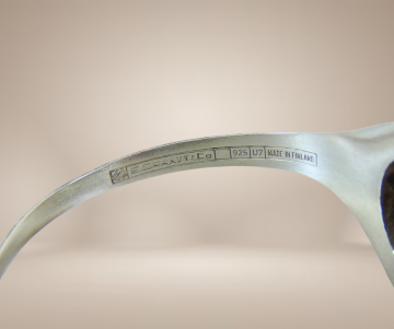 E granit finland modernistische zilveren bolletjes armband beige achtergrond 6