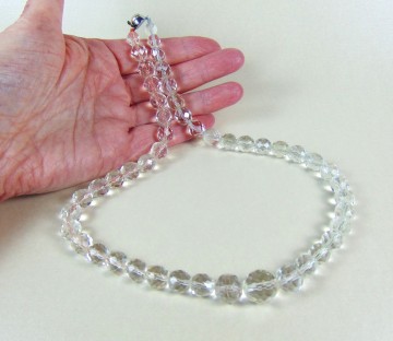 Enkel streng grote  ronde facet kralen spheres en chute faux parel sluiting 1