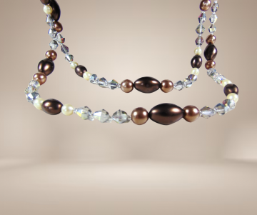 Germany lange dubbele bruine faux parel aurora borealis ketting beige achtergrond 4