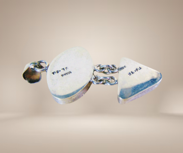 Grote dubbele taxco mexico zilver bloedsteen hanger beige achtergrond