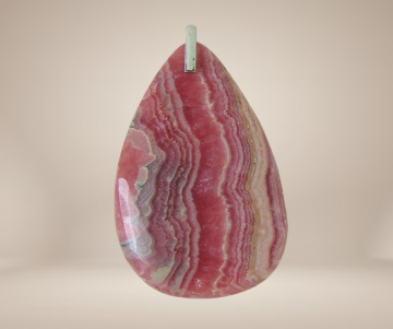 Grote rhodochrosiet druppel hanger beige achtergrond 2