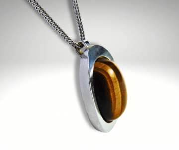 Grote teka theodor klotz modernist zilver tijgeroog hanger ketting  pr