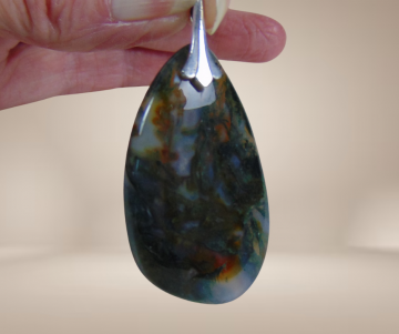 Grote vintage mosagaat hanger zilveren art deco oog beige achtergrond 1