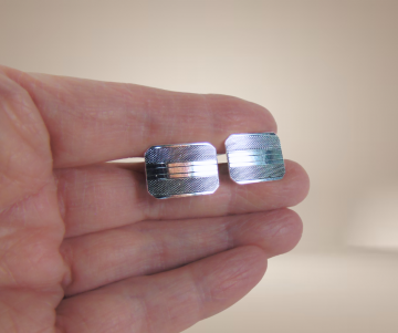 Herman murle zilveren manchetknopen beige achtergrond 3