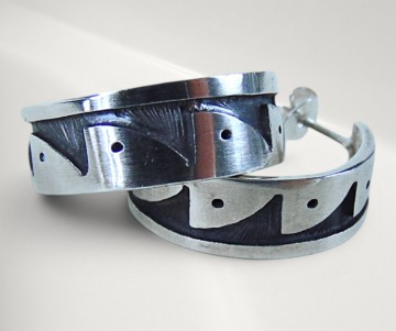 Hopi native american zilveren overlay creolen oorbellen pr achtergrond 1