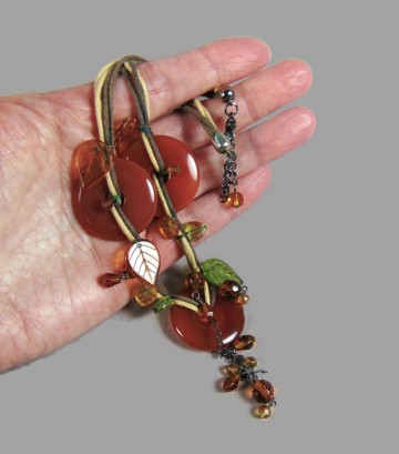 Leren veter ketting met carneool donuts 1