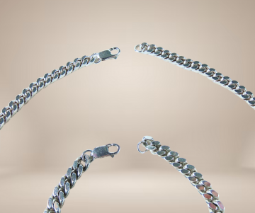 Massief zilveren gourmet schakel ketting armband set beige achtergrond 2