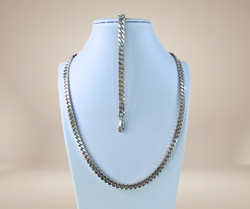 Massief zilveren gourmet schakel ketting armband set beige achtergrond 3