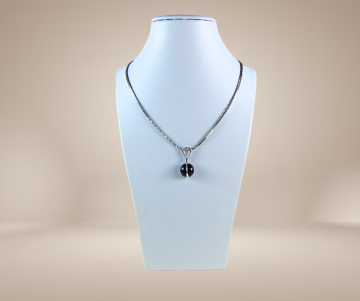 Modernistische 835 zilveren ketting hanger onyx streep beige achtergrond 4