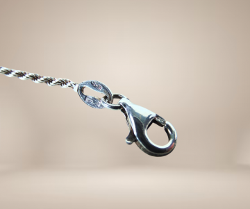 Nicole preziosi arezzo huisjes zilveren armband beige achtergrond