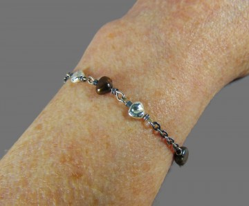 Nine west zilveren armband bruine parel  hartjes  1