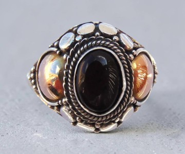 Oosterse zilver en verguld granaat ring pr 2