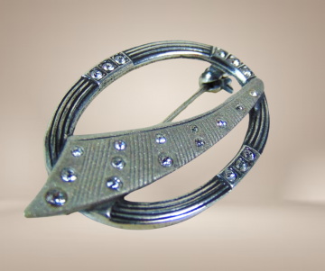 Ovale zilveren space age  beige achtergrond