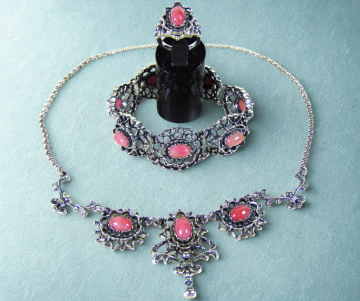 Set blachian bas 835 zilveren set rhodochrosiet lichtblauwe achtergrond