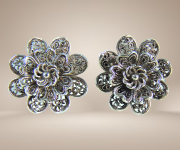 Set filigraan clip oorbellen en ring beige achtergrond