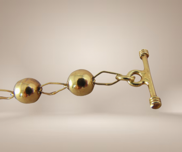 Vermeil verguld zilveren bolletjes schakel toggle armband beige achtergrond 2